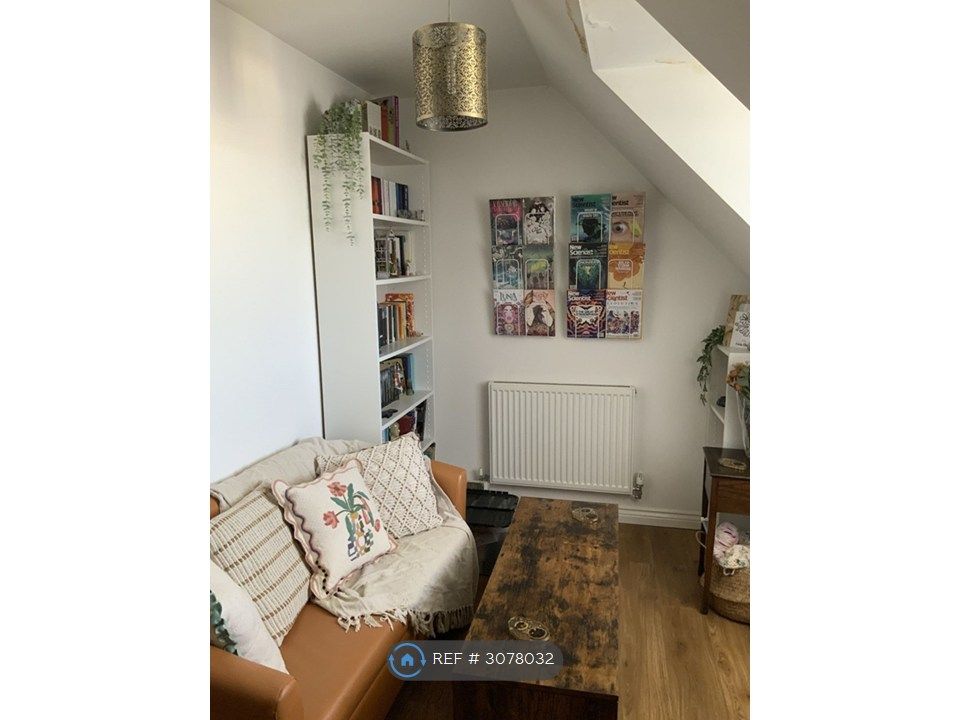 Property photo 3 of 13 Living Area
