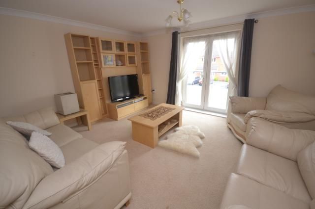 Property photo 1 of 7 Living Area