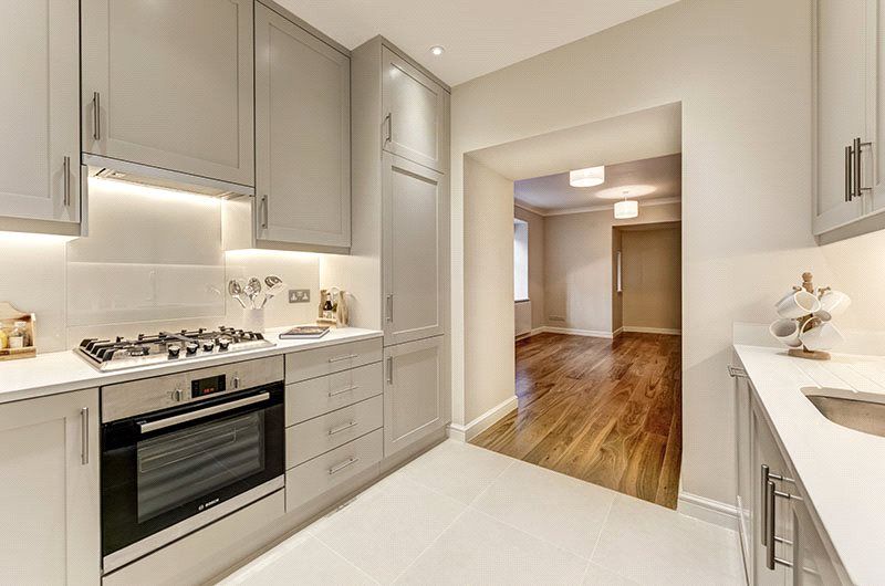 Property photo 3 of 8 Kitchen