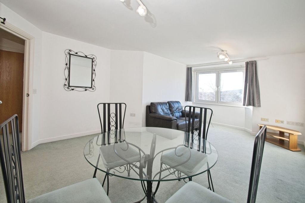 Property photo 3 of 12 Living/Dining Area