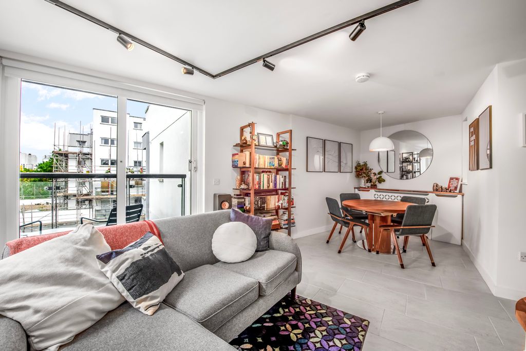 Property photo 3 of 17 Living / Dining Room