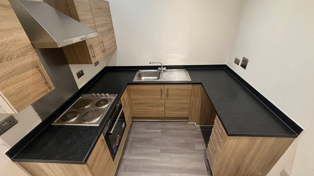 Property photo 3 of 8 Kitchen