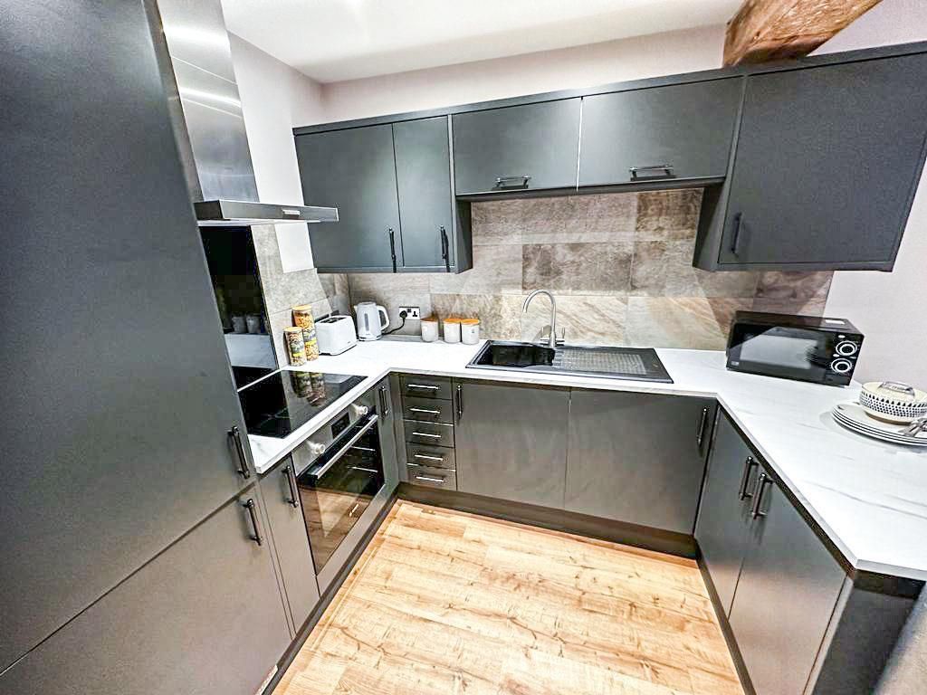 Property photo 1 of 8 Kitchen