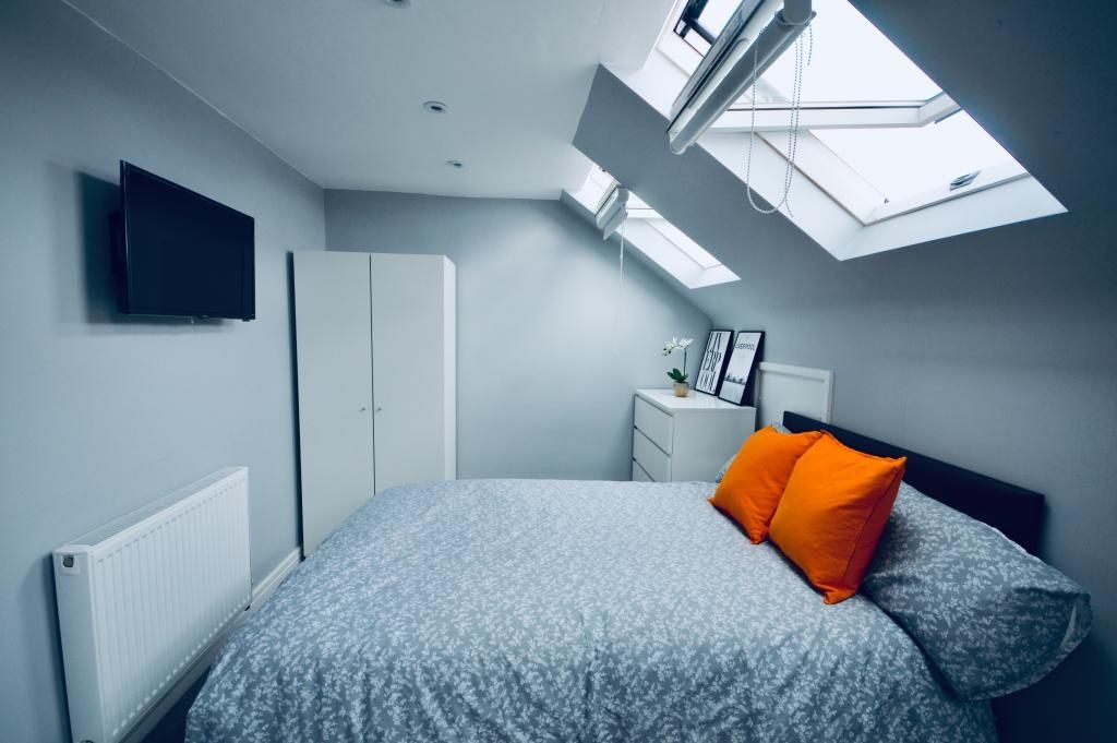 Property photo 1 of 13 Bright And Spacious Master Bedroom Featuring A Lar...