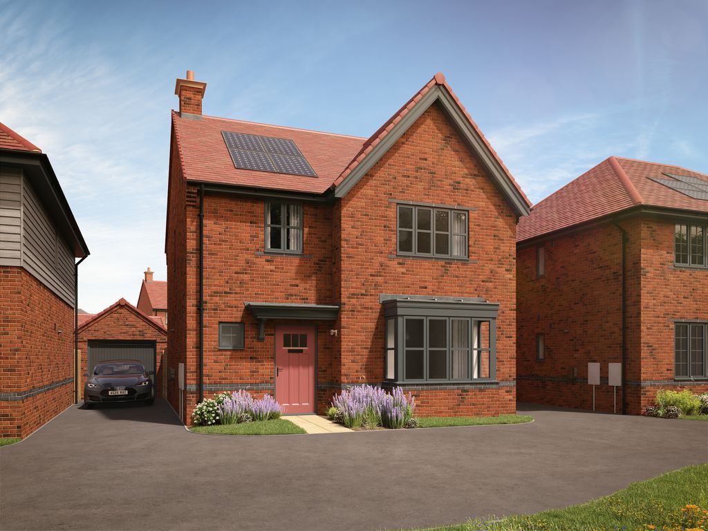 Property photo 1 of 10 A Red Brick House With Solar Panels On The Roof Sits In The Foreground