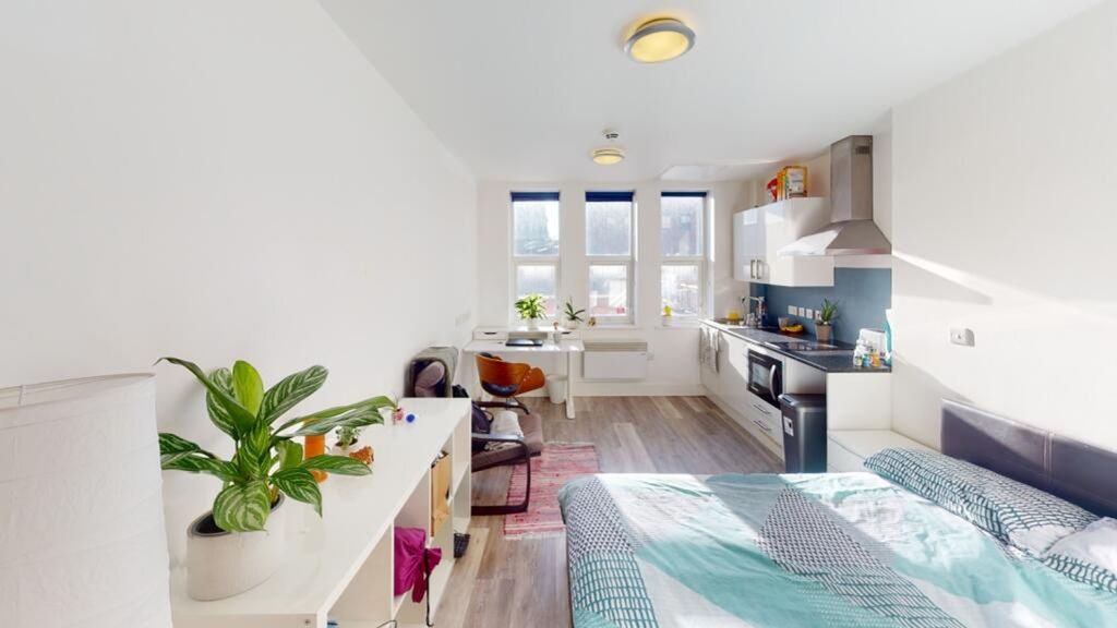 Property photo 2 of 4 A Stylish Double Bedroom Featuring Large Windows T...