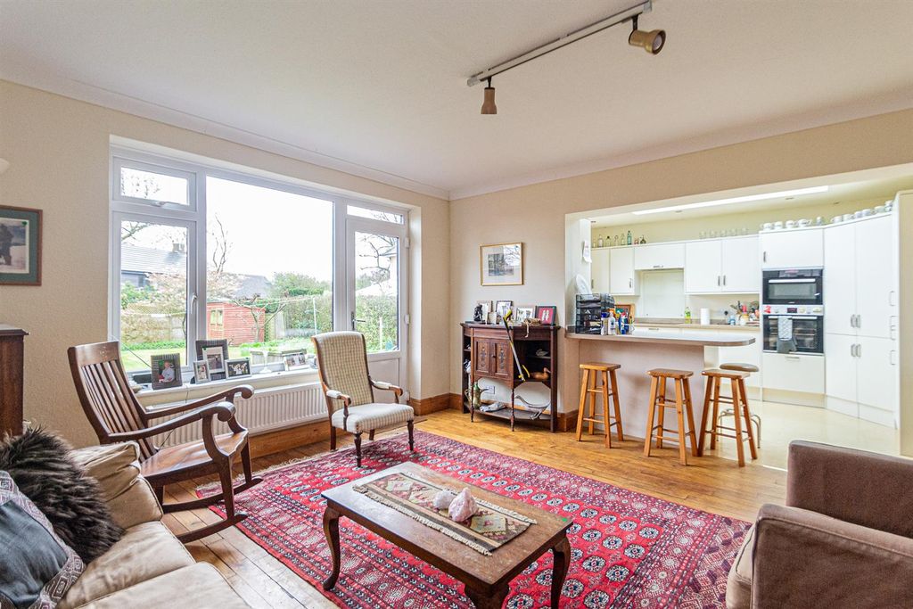 Property photo 2 of 21 Family Room & Dining Kitchen