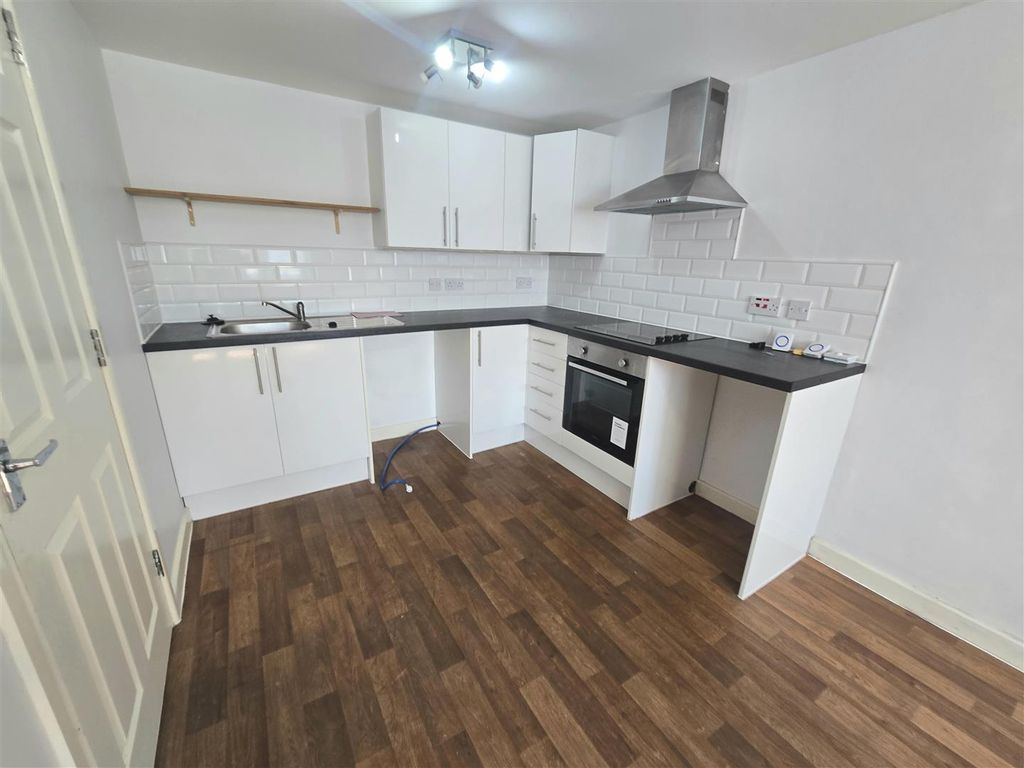 Property photo 3 of 7 Kitchen Area