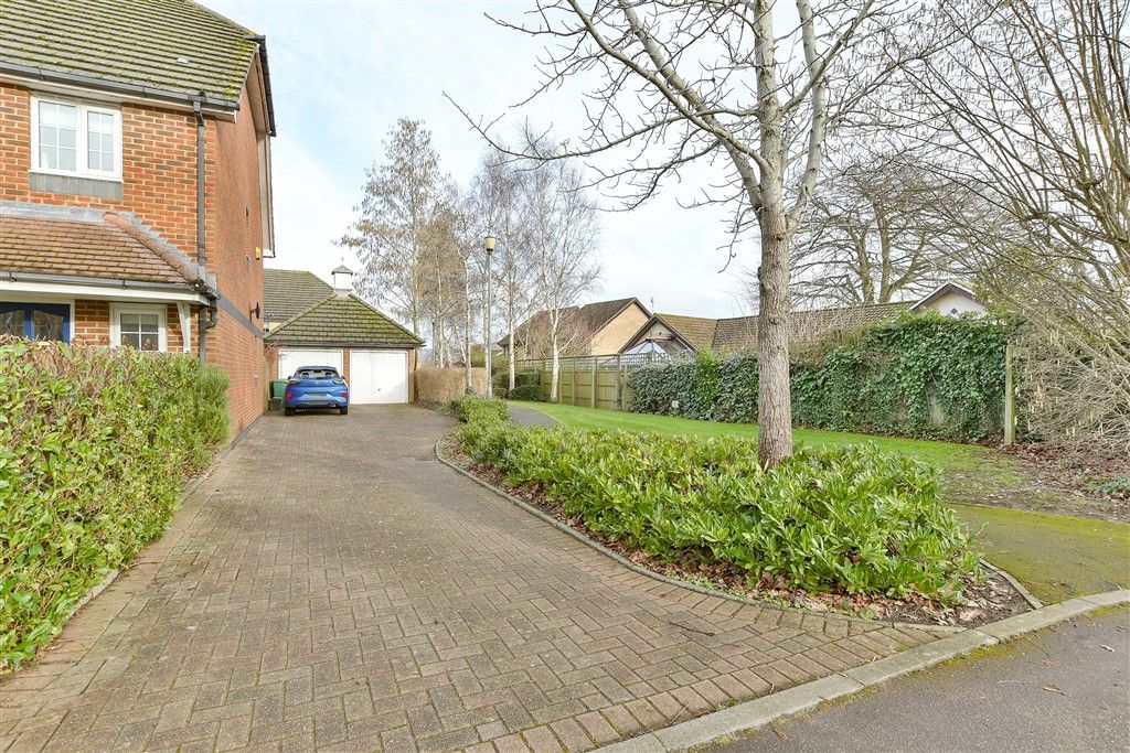 Property photo 2 of 12 Garage