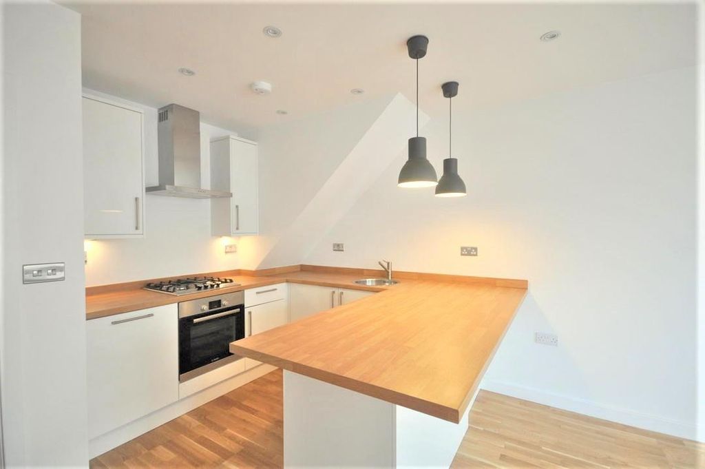 Property photo 2 of 12 Kitchen Area
