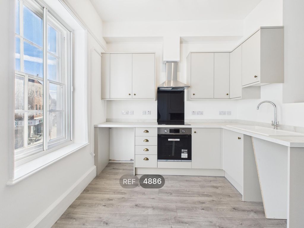 Property photo 1 of 9 Kitchen/Living Area