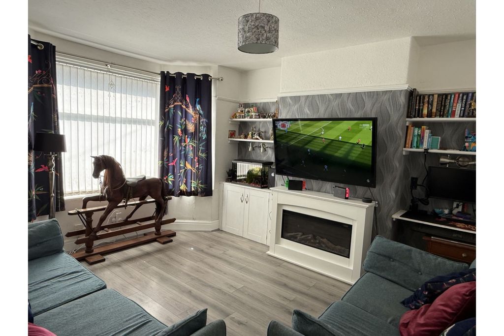 Property photo 3 of 12 Living Room