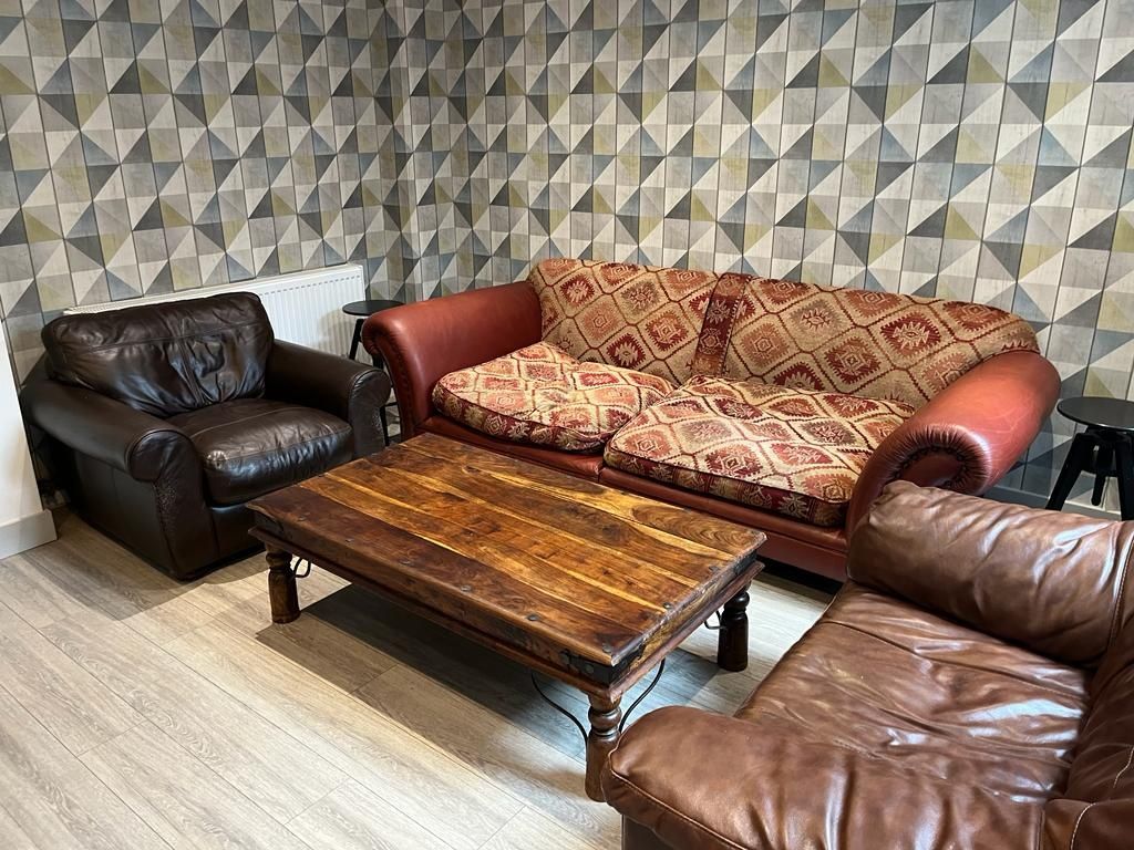 Property photo 2 of 13 Elegant And Inviting Living Room Featuring A Varie...