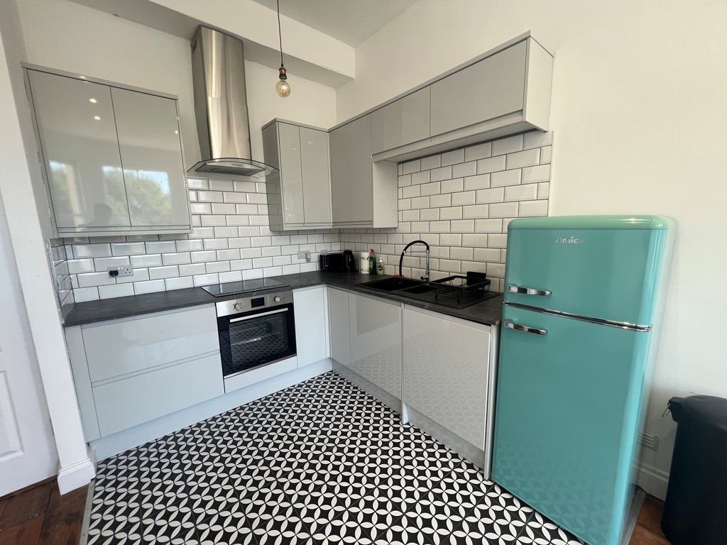 Property photo 1 of 6 Kitchen