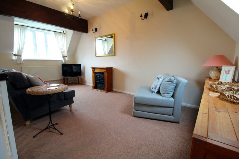 Property photo 2 of 8 Living Room