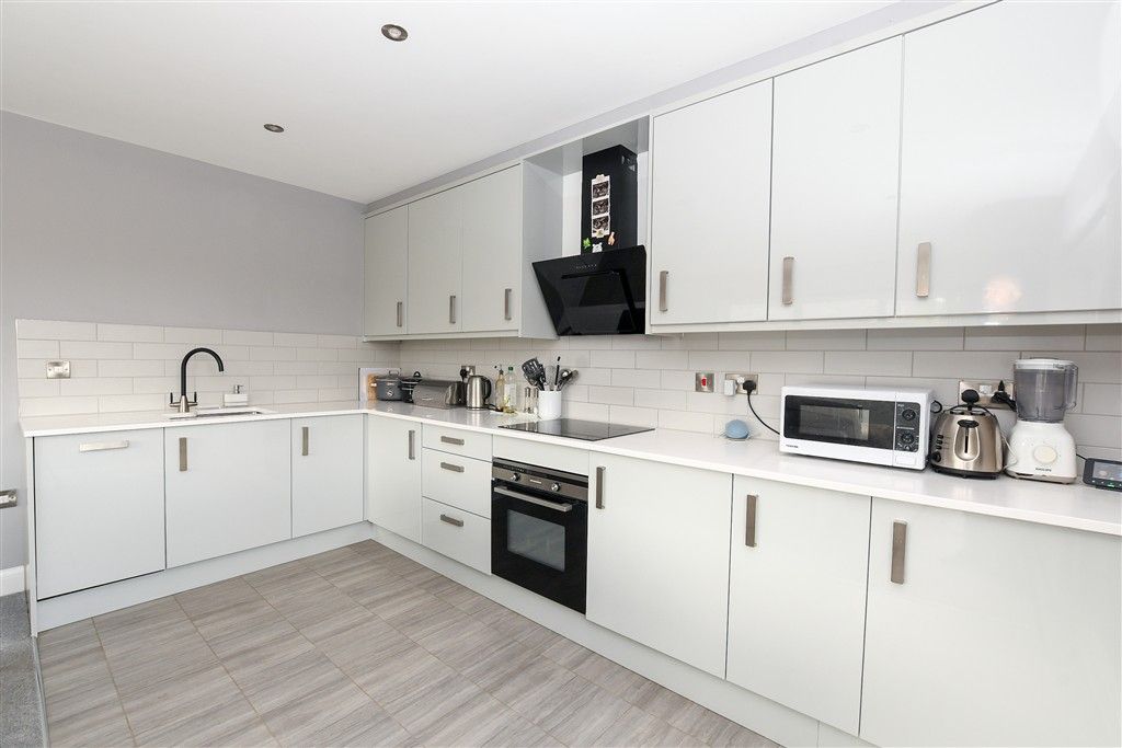 Property photo 2 of 12 Kitchen Area