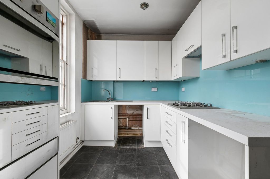Property photo 2 of 12 Kitchen