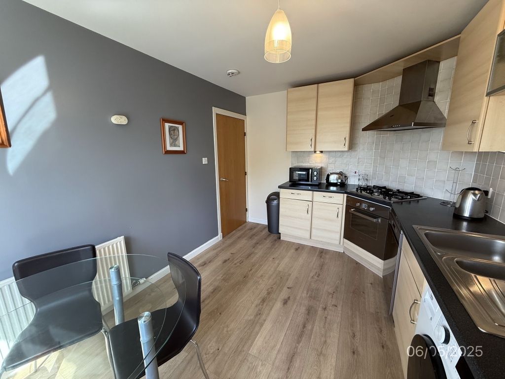 Property photo 2 of 12 Kitchen