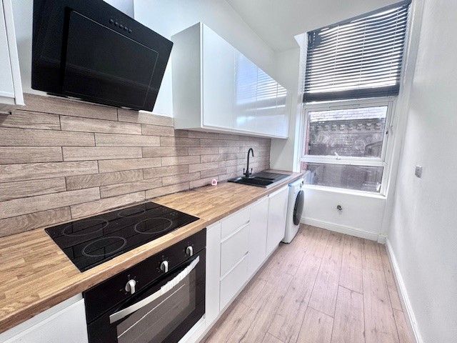 Property photo 1 of 8 Kitchen