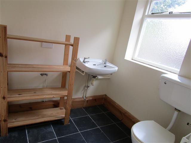 Property photo 2 of 8 Utility Room
