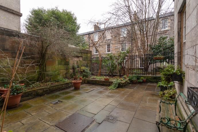Property photo 2 of 11 Welcoming Courtyard At Entrance To Property