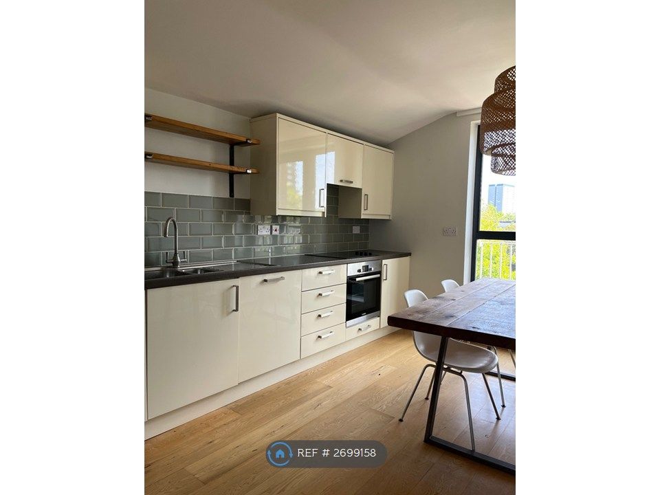 Property photo 3 of 13 Kitchen And Dining Room