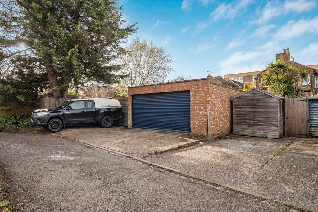 Property photo 2 of 21 Garage And Drive