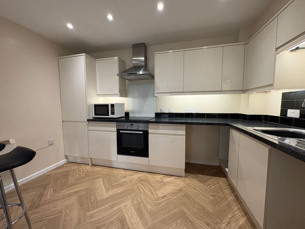 Property photo 3 of 11 Kitchen