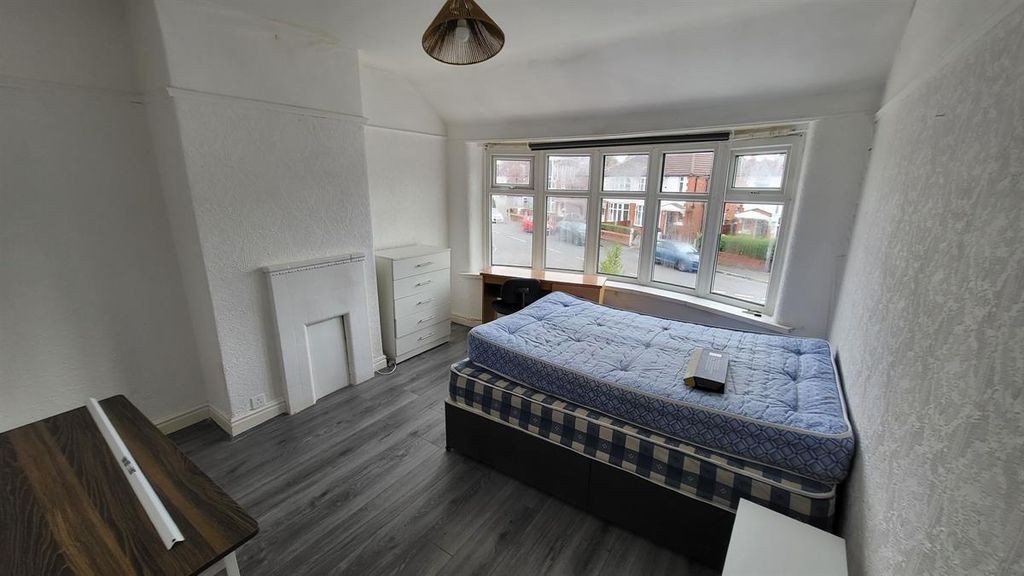 Property photo 2 of 9 Spacious Master Bedroom With A Large Window Provid...