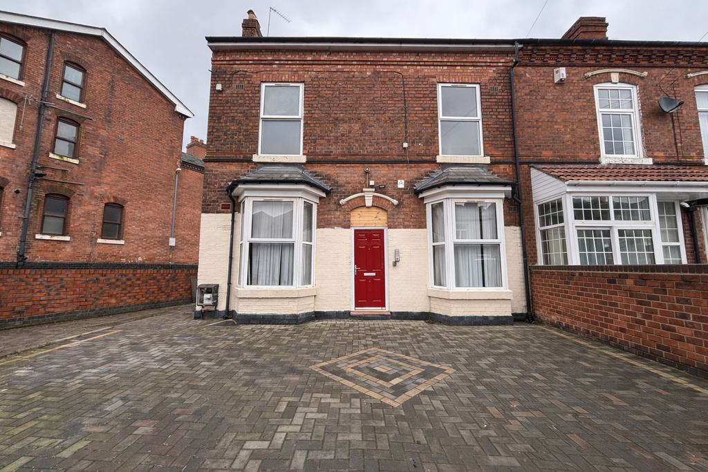 Property photo 3 of 7 Front With Driveway
