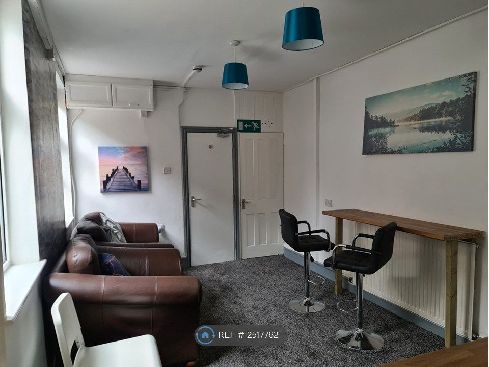 Property photo 2 of 7 Living Area 1