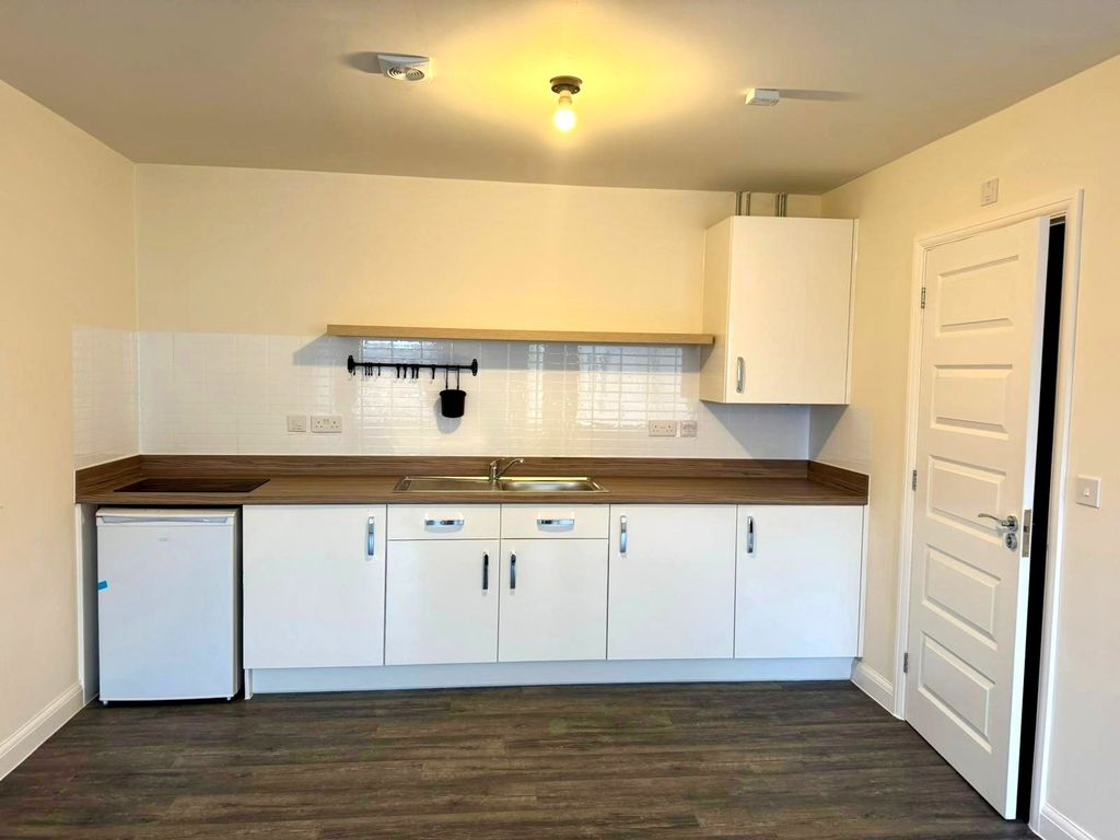 Property photo 2 of 4 Kitchen Area