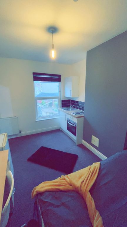 Property photo 3 of 4 A Cozy Living Area With A Large Window That Offers...