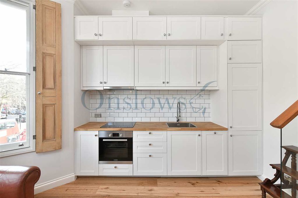 Property photo 3 of 8 Kitchen