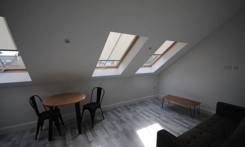 Property photo 2 of 17 A Bright, Modern Living Room With Large Skylight W...