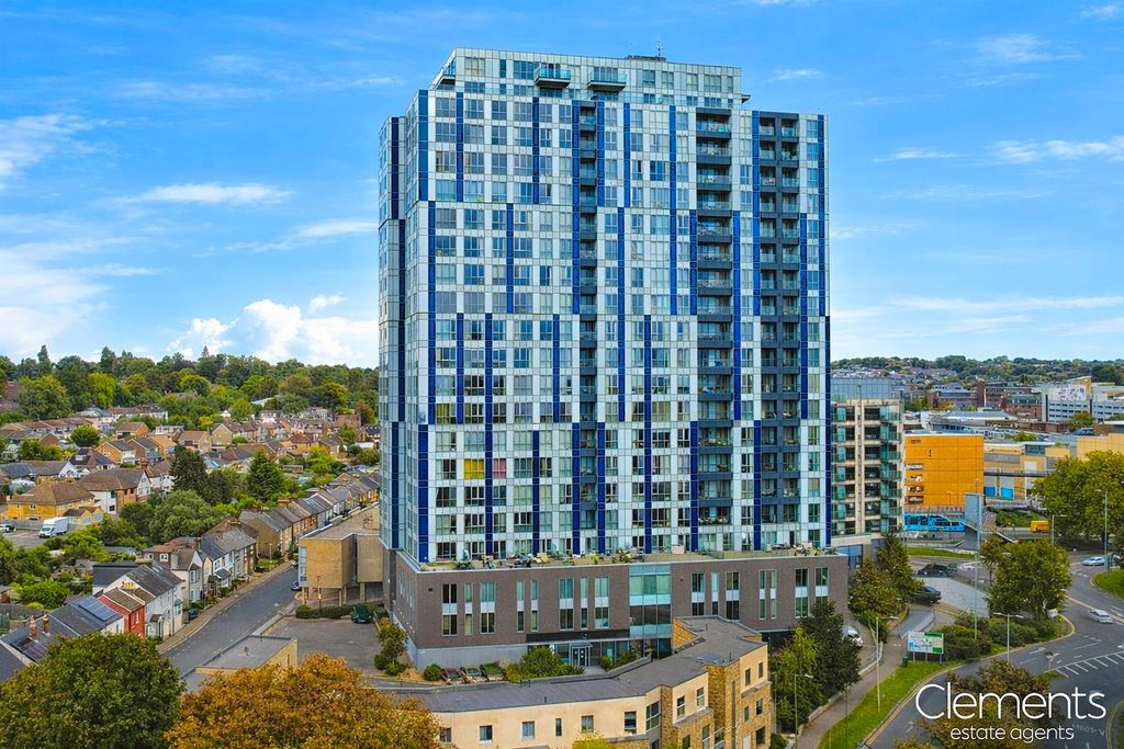 Property photo 1 of 11 Modern High-Rise Over Traditional Suburb.Png