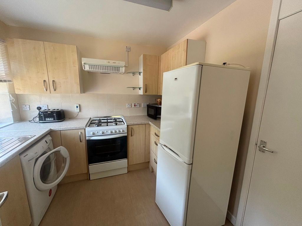 Property photo 3 of 7 Kitchen