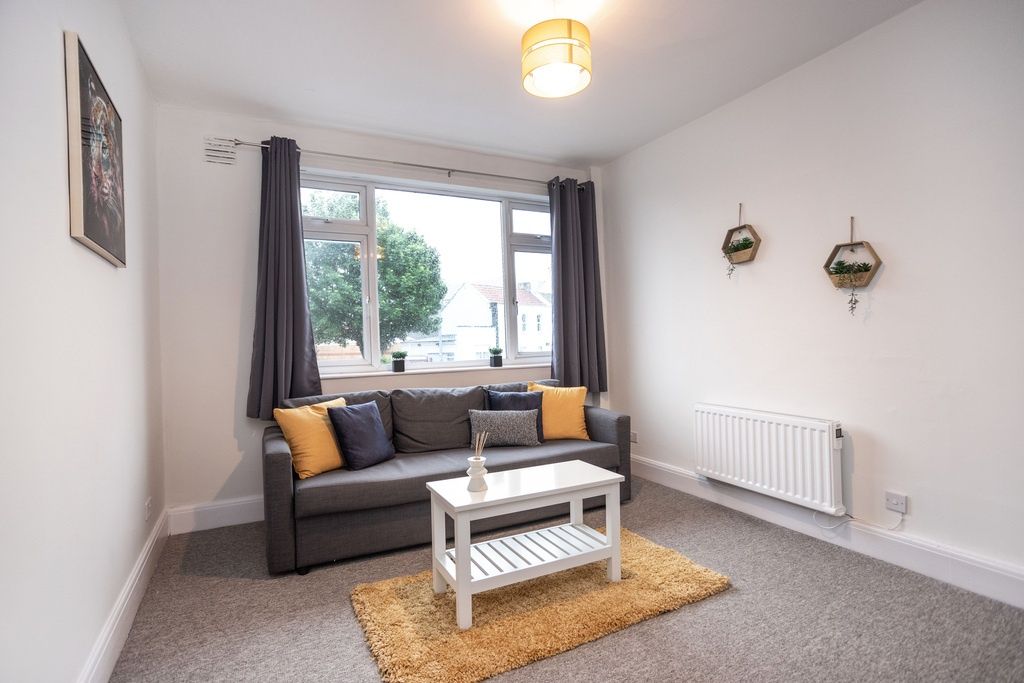 Property photo 3 of 14 Bright, Neatly Styled Living Room With A Large Fro...