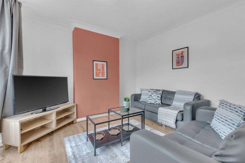 Property photo 2 of 11 Stylish Living Room With TV And Modern Sofas...