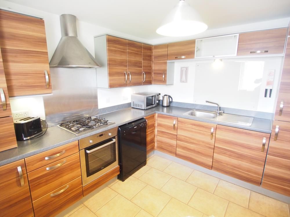 Property photo 3 of 8 Kitchen