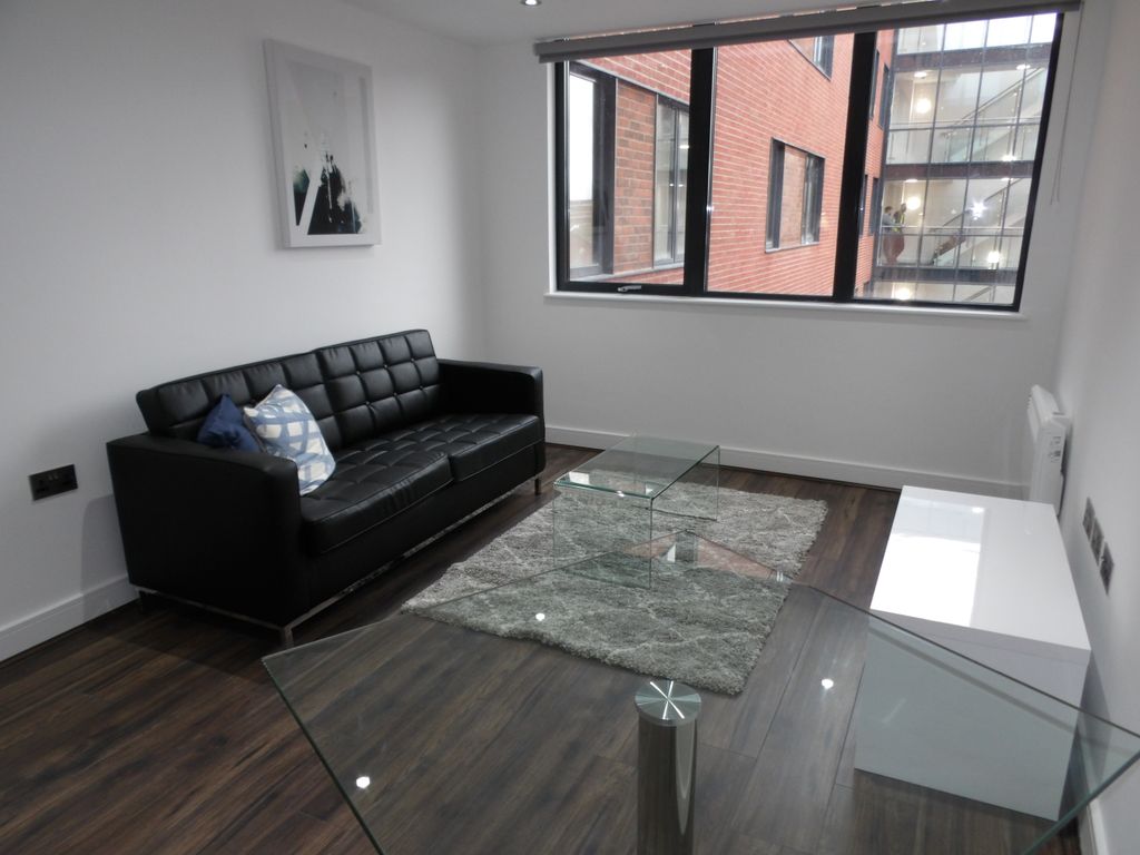 Property photo 1 of 8 Living Area