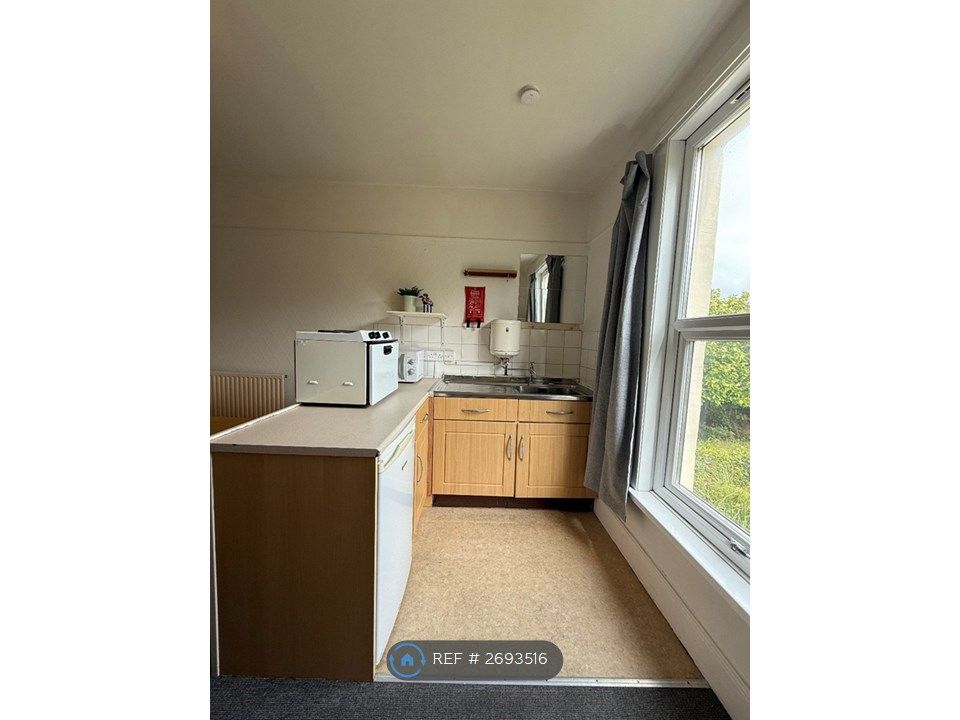 Property photo 3 of 3 Kitchen Area