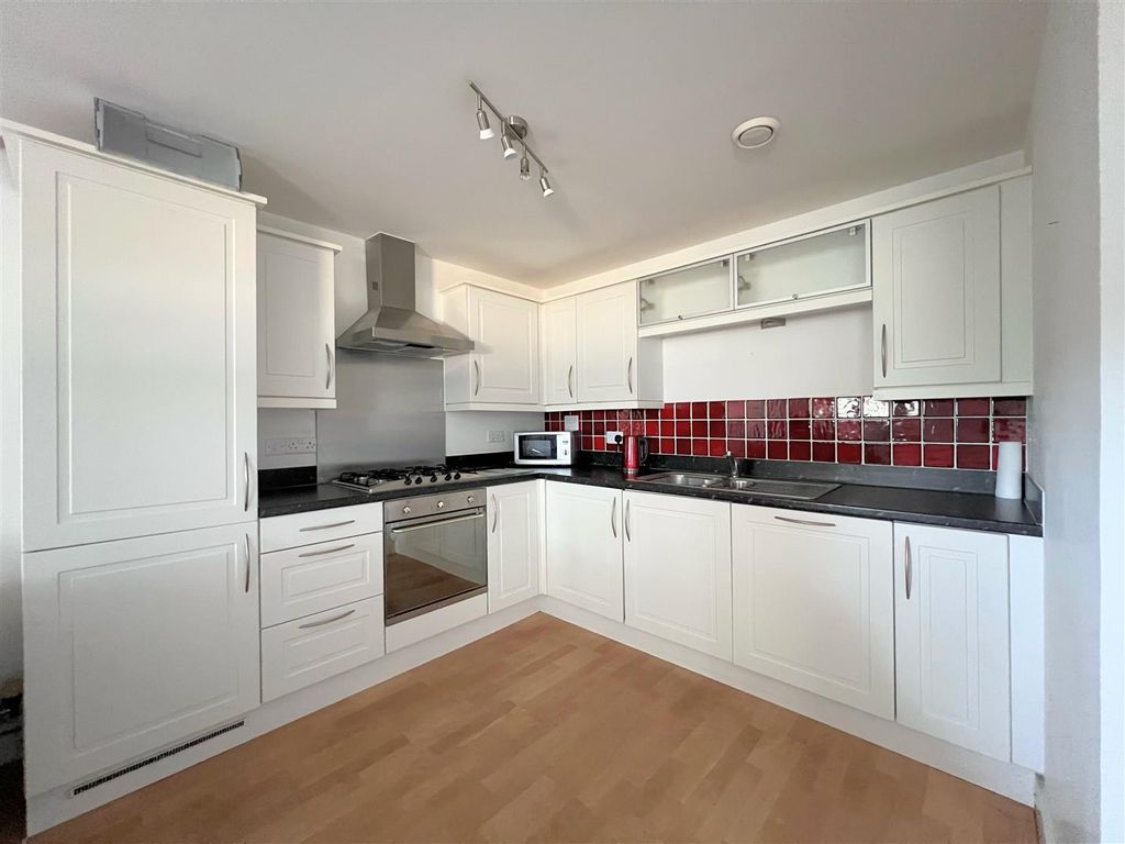 Property photo 3 of 13 Kitchen Area