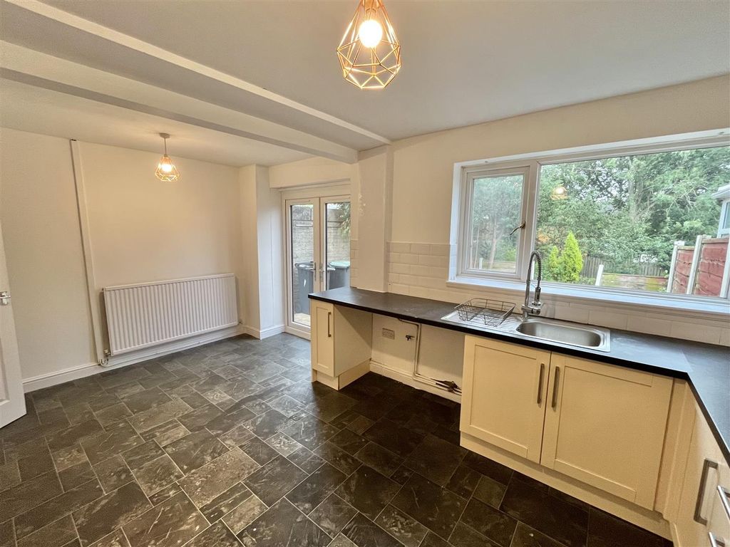 Property photo 3 of 12 Dining Kitchen
