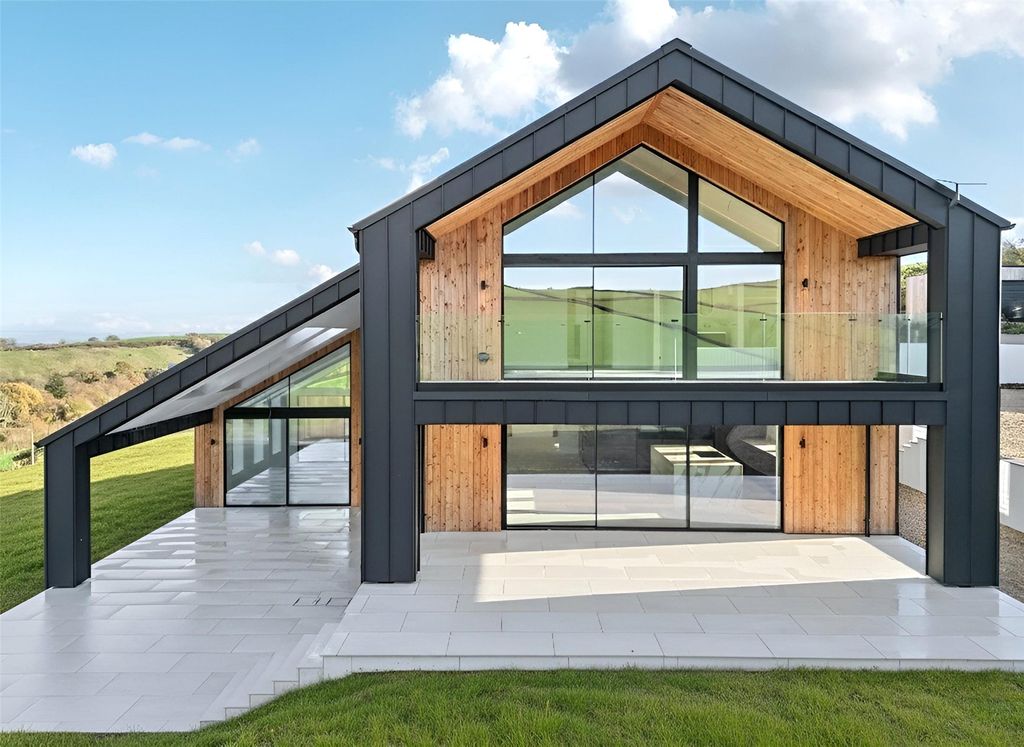 Property photo 1 of 24 West Elevation