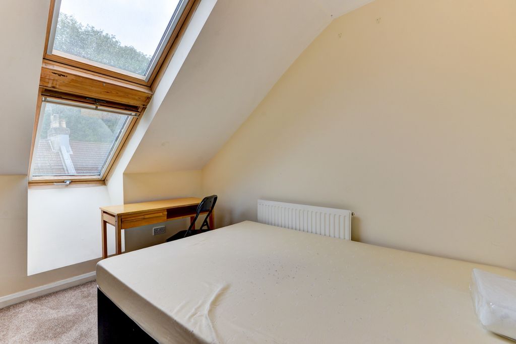 Property photo 3 of 27 A Well-Lit, Inviting Master Bedroom With A Large W...