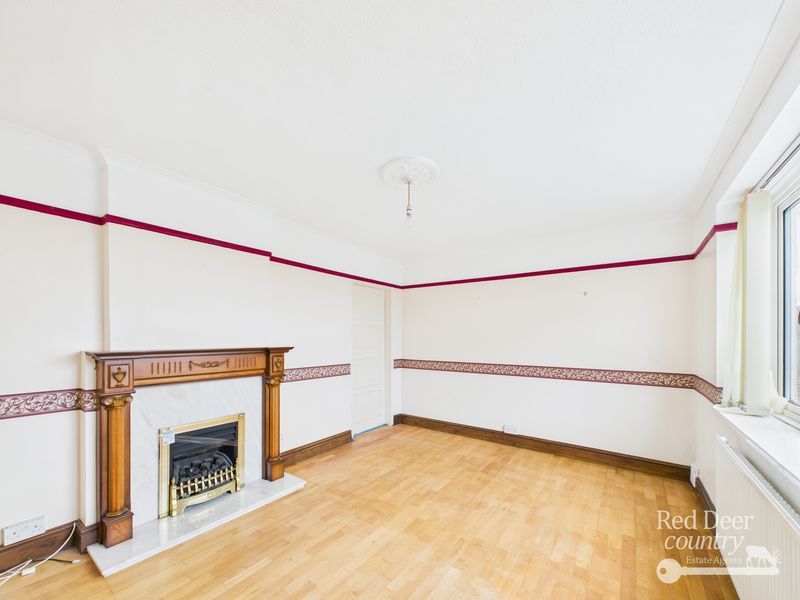 Property photo 2 of 12 Sitting Room