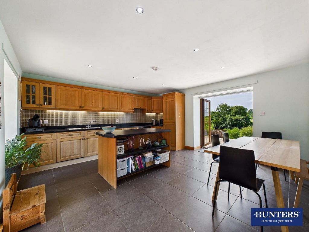 Property photo 2 of 28 Dining Kitchen