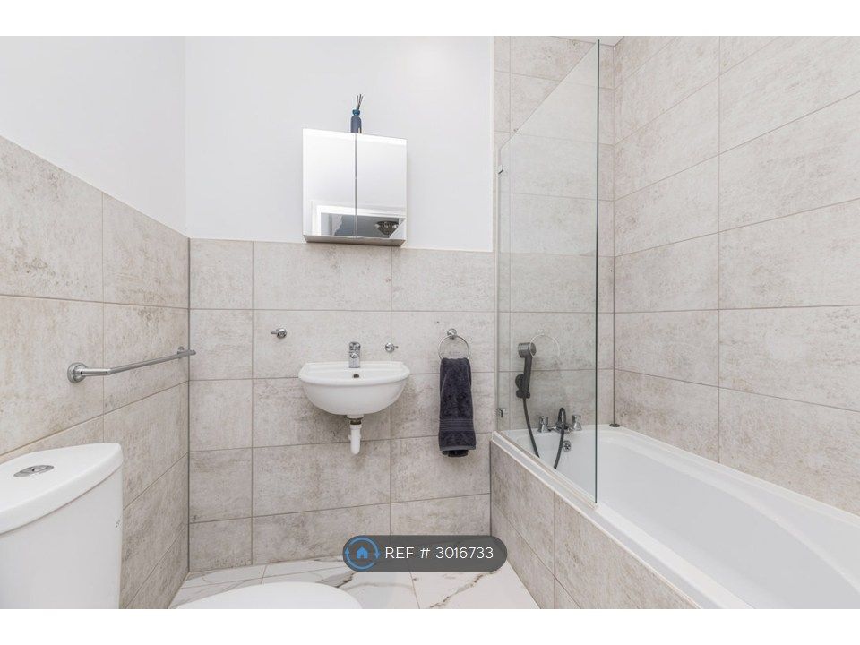 Property photo 2 of 8 Downstairs Bathroom