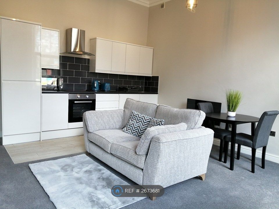 Property photo 3 of 15 Living Room, Kitchenette, And Dining Area